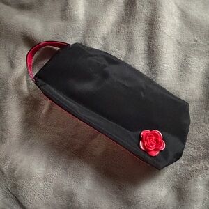 Black Lancôme Cosmetic Bag with Red Flower Accent